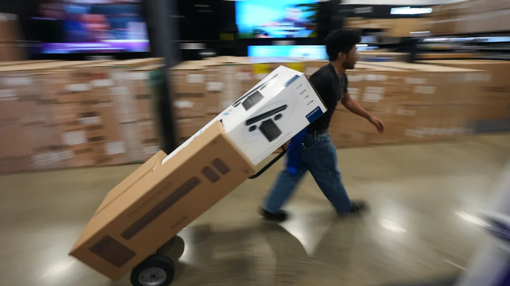 Retail sales rose slightly in September as Americans pulled back on spending