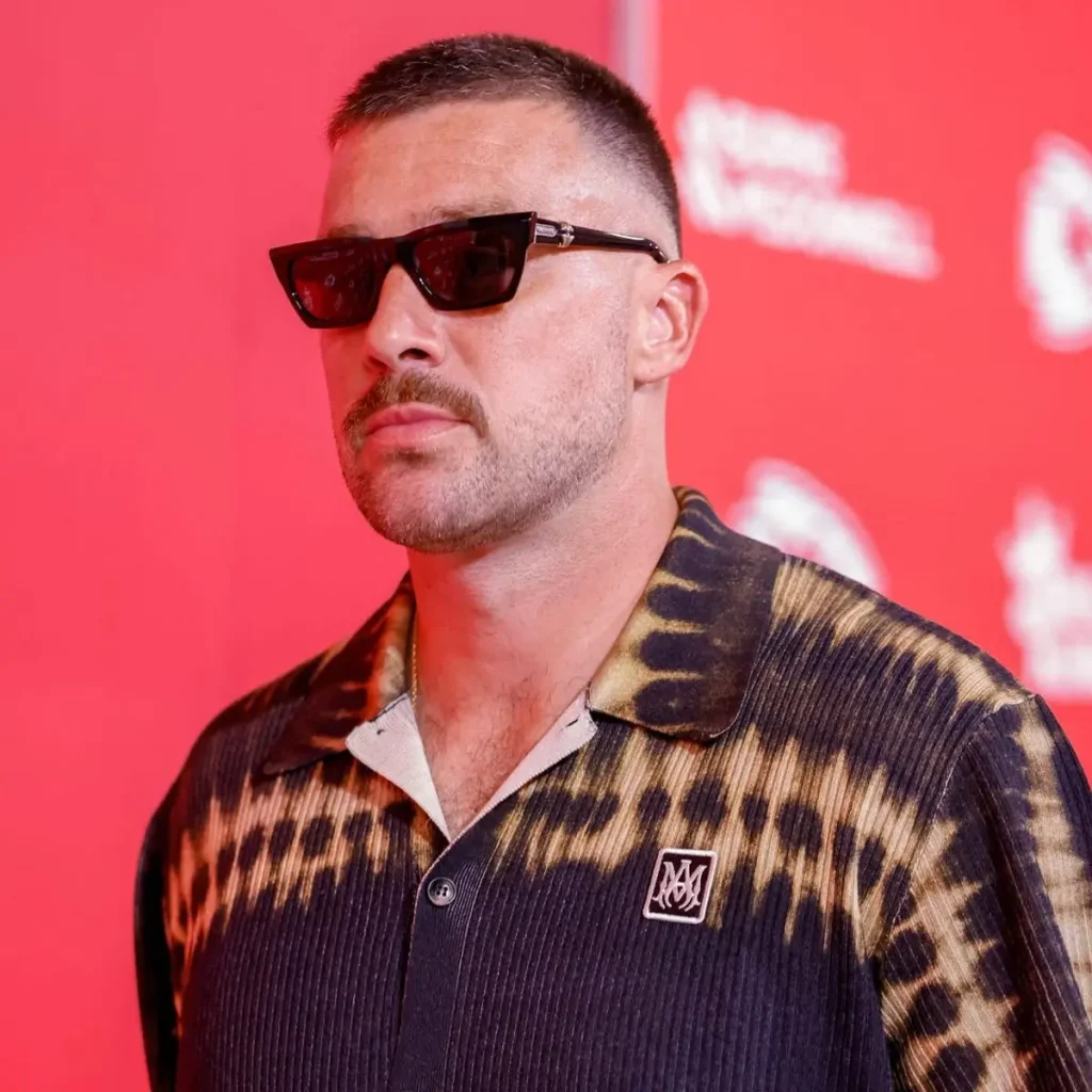 Travis Kelce Returns in Wedding Ring and Designer Fit